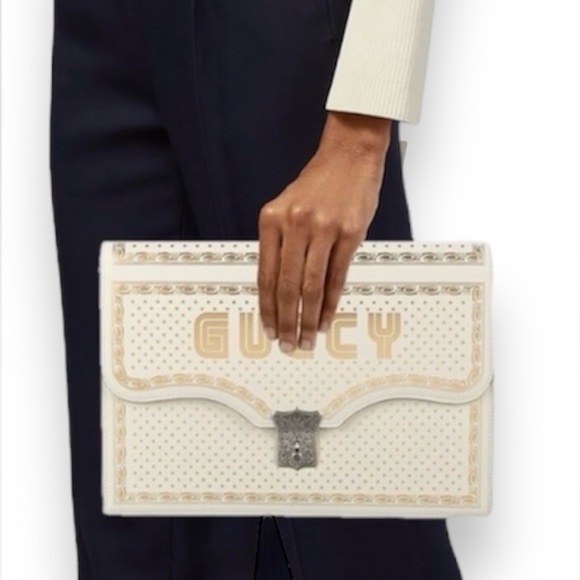 Gucci Handbags - Gucci Leather Star Printed Calfskin GUCCY Clutch Portfolio Clutch Bag